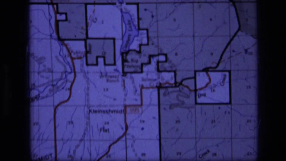 Purple-blue 8mm frame of the Montana wilderness map, including readable labels and dark gate borders from projection.