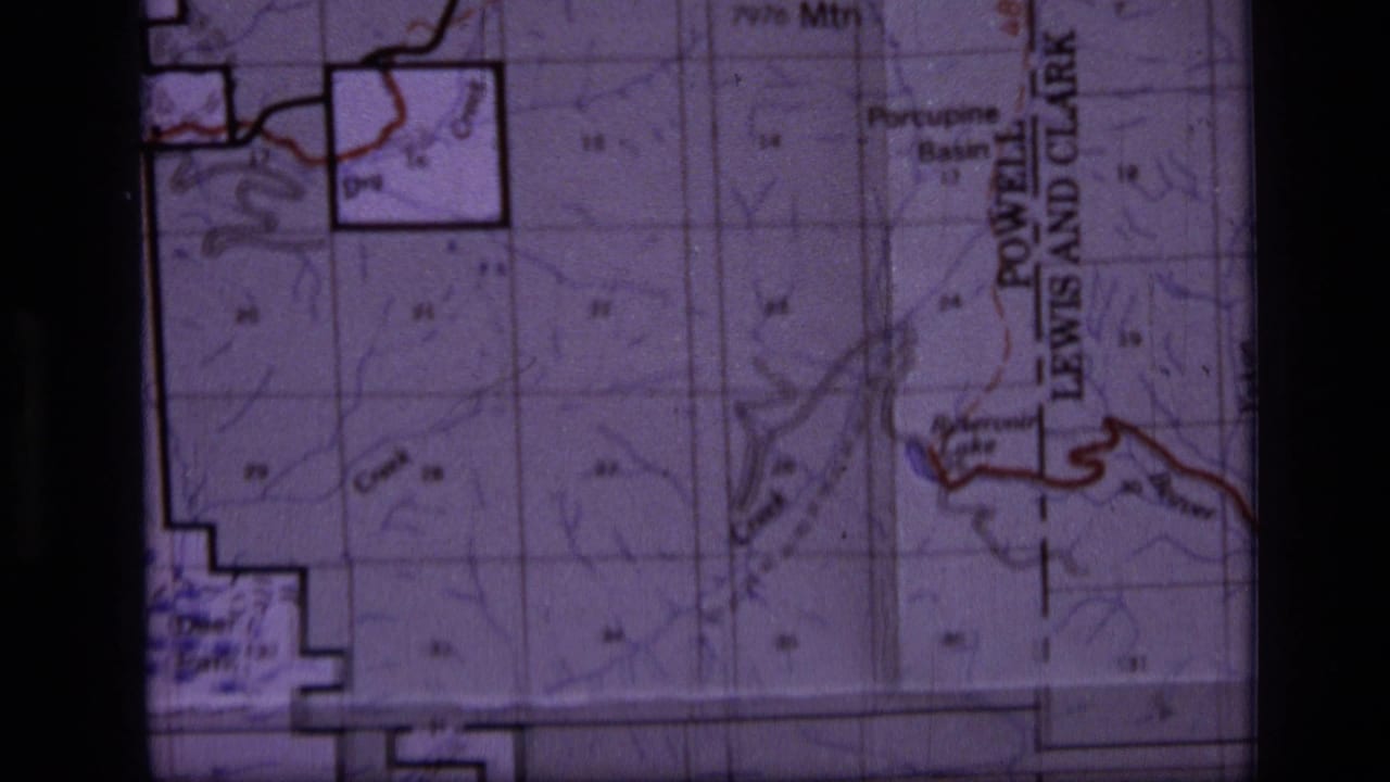 Close 1973 8mm frame of a Scapegoat Wilderness area map showing contours, creeks, basin labels, and boundary markings.