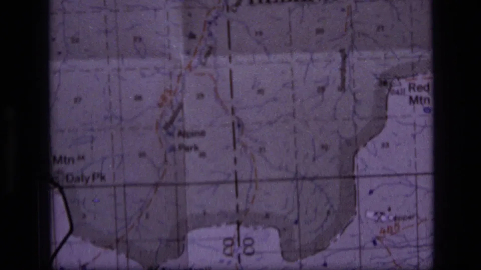 Close 8mm view of the Scapegoat Wilderness area map, with Alpine Park, Daly Peak, Red Mtn, and printed terrain lines visible.