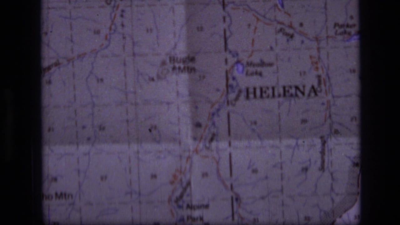 1973 8mm close-up of a Montana map around Helena, with named terrain and dark scan borders visible.