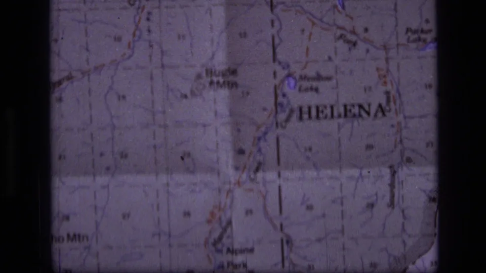 1973 8mm close-up of a Montana map around Helena, with named terrain and dark scan borders visible.