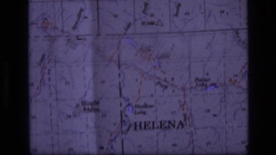 The map remains in close-up, with Helena and surrounding Montana place labels visible through soft 8mm color fading.