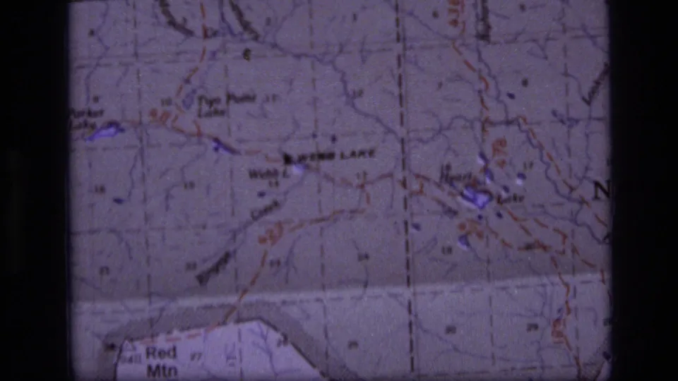 8mm close-up of the Scapegoat Wilderness map area, with Webb Lake, Heart Lake, contour lines, and printed route information visible.