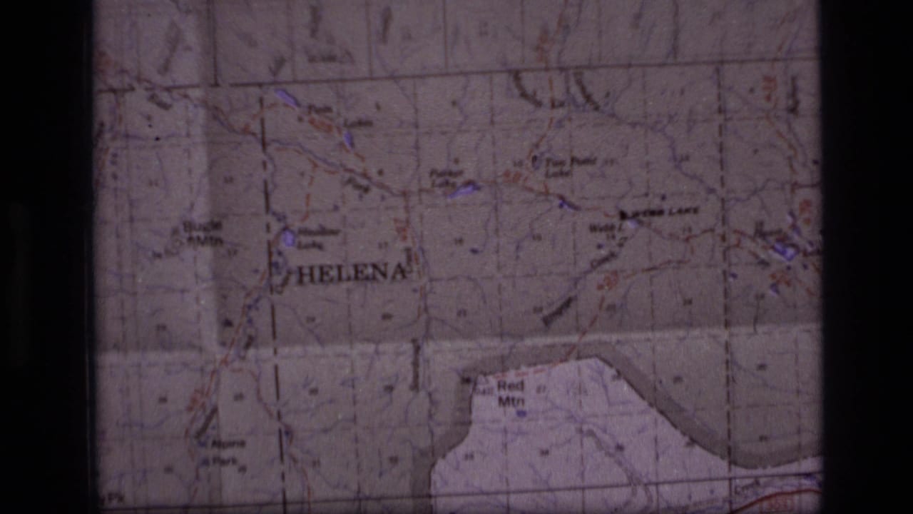 Close view of a folded Montana map with Helena and nearby mountain labels visible.