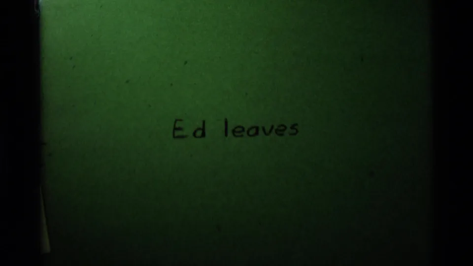 Green 8mm title card with handwritten text reading Ed leaves, following the Montana horse farewell footage.