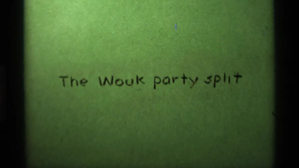 A second view of the 1975 8mm title card shows the handwritten phrase The Wouk party split on green leader.