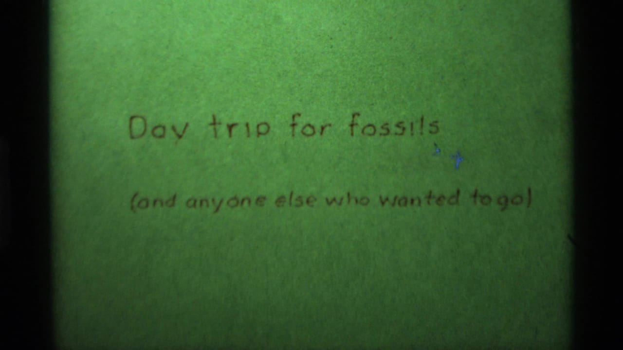 1975 Agate Springs, Montana 8mm title card reading Day trip for fossils, with a smaller parenthetical line below.