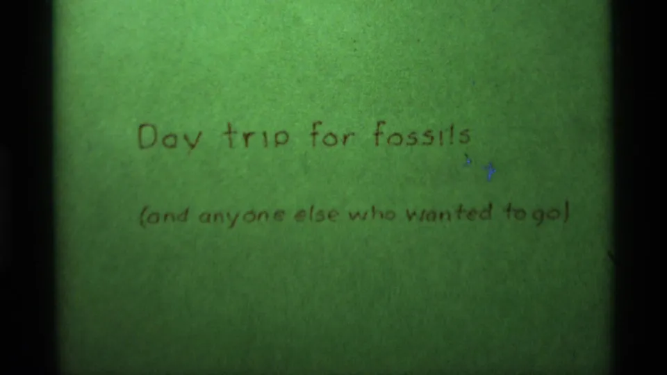 1975 Agate Springs, Montana 8mm title card reading Day trip for fossils, with a smaller parenthetical line below.