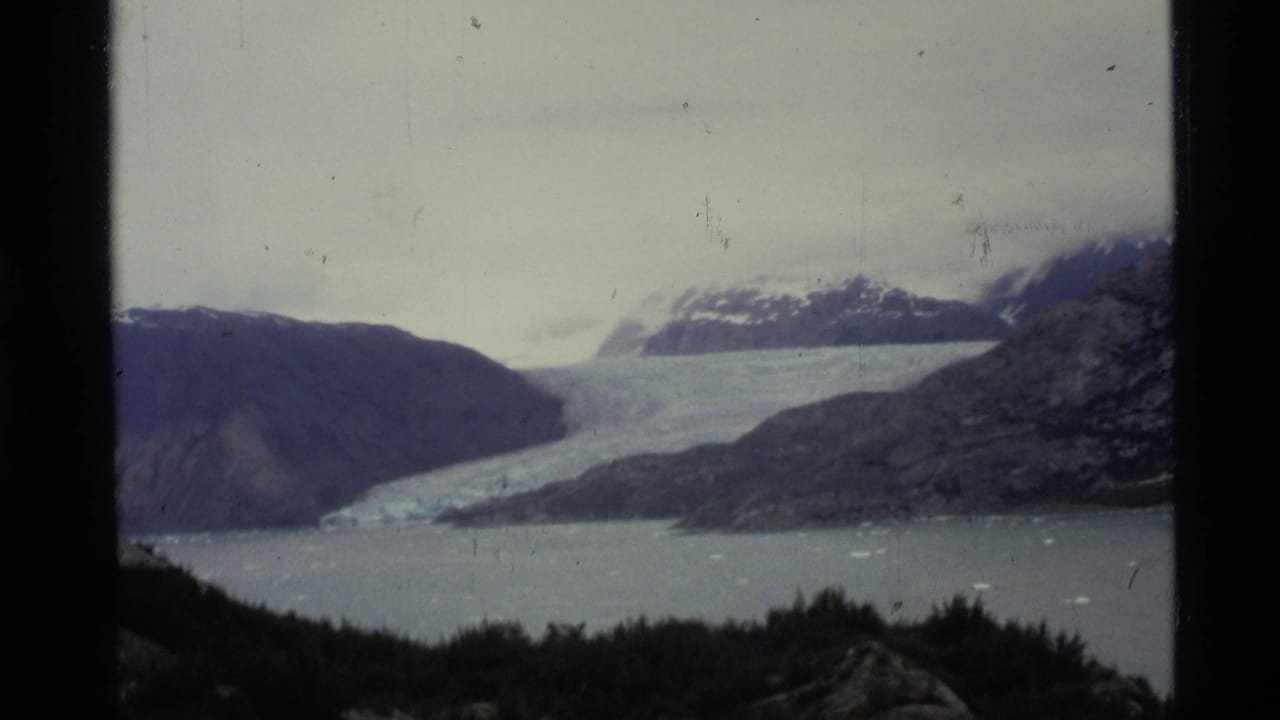 Distant glacier and bay seen through 8mm frame borders.
