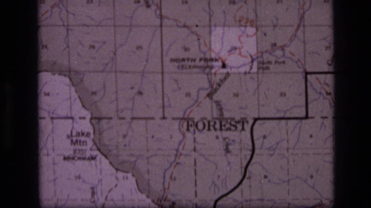 1973 8mm frame of a Scapegoat Wilderness, Montana topographic map showing Lake Mtn, North Fork, boundary lines, and contour detail.
