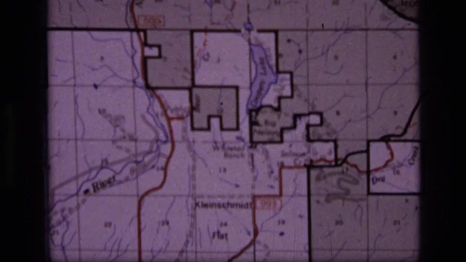 1973 archival map close-up from Scapegoat Wilderness, Montana, showing labeled terrain, waterways, route lines, and dark outlined map areas.