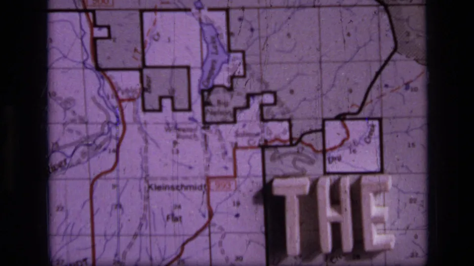 Close-up of a topographical map associated with the Scapegoat Wilderness sequence, with large title lettering partly visible.