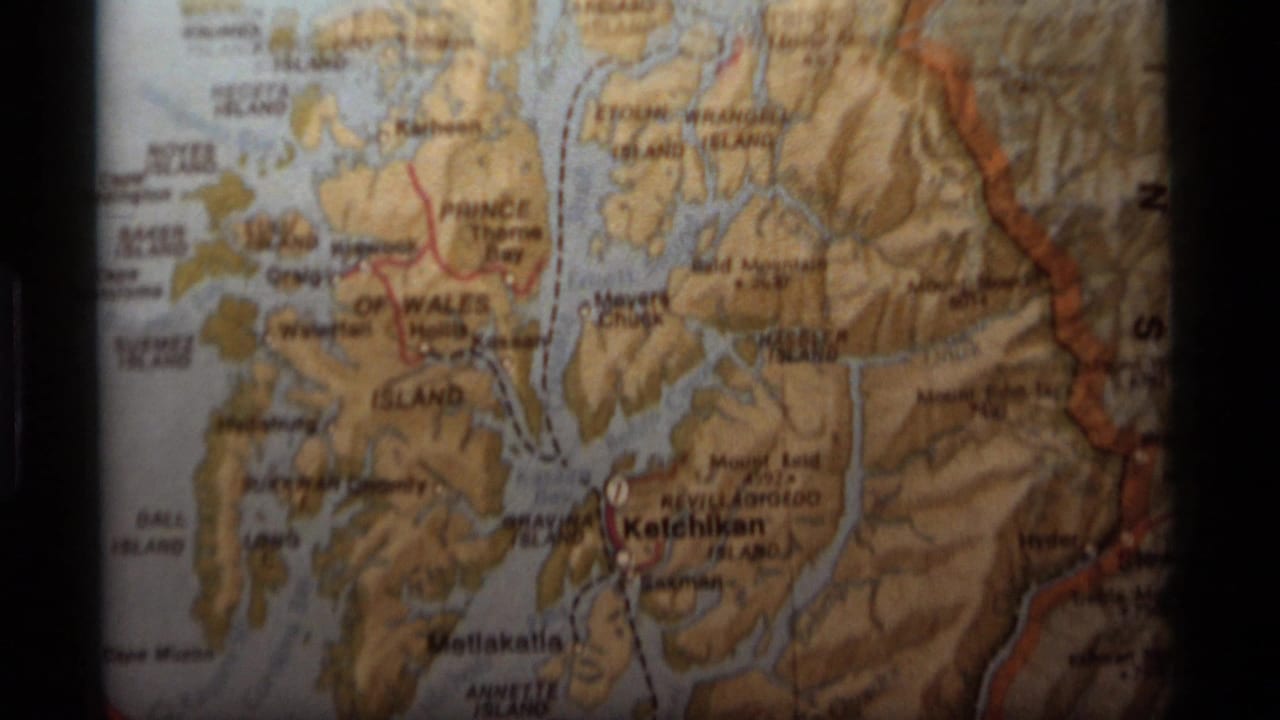 Close-up of a printed Alaska map with Prince of Wales Island and Ketchikan visible.