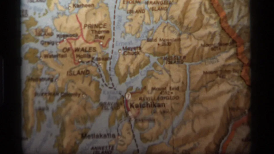 Soft 8mm close-up of an Alaska map, with Prince of Wales Island and nearby waterways visible.
