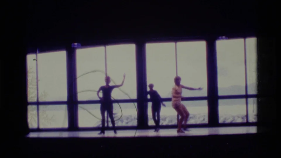 The final frame shows the Alaska stage dance continuing in silhouette, with performers posed against bright windows and snowy outdoor terrain.