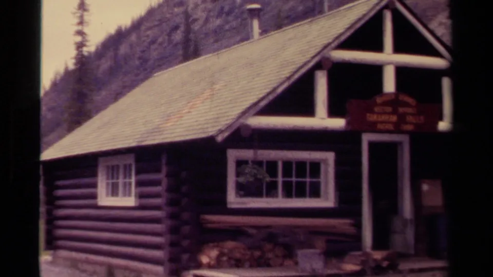 End frame of the 1979 Canada 8mm clip showing the Takakkaw Falls Patrol Cabin exterior in its mountain setting.