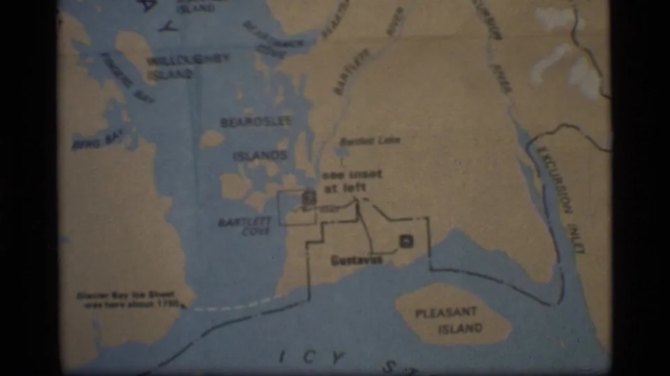 Final 8mm frame holds on the Glacier Bay regional map, including Beardslee Islands, Bartlett Cove, Gustavus, and Pleasant Island.