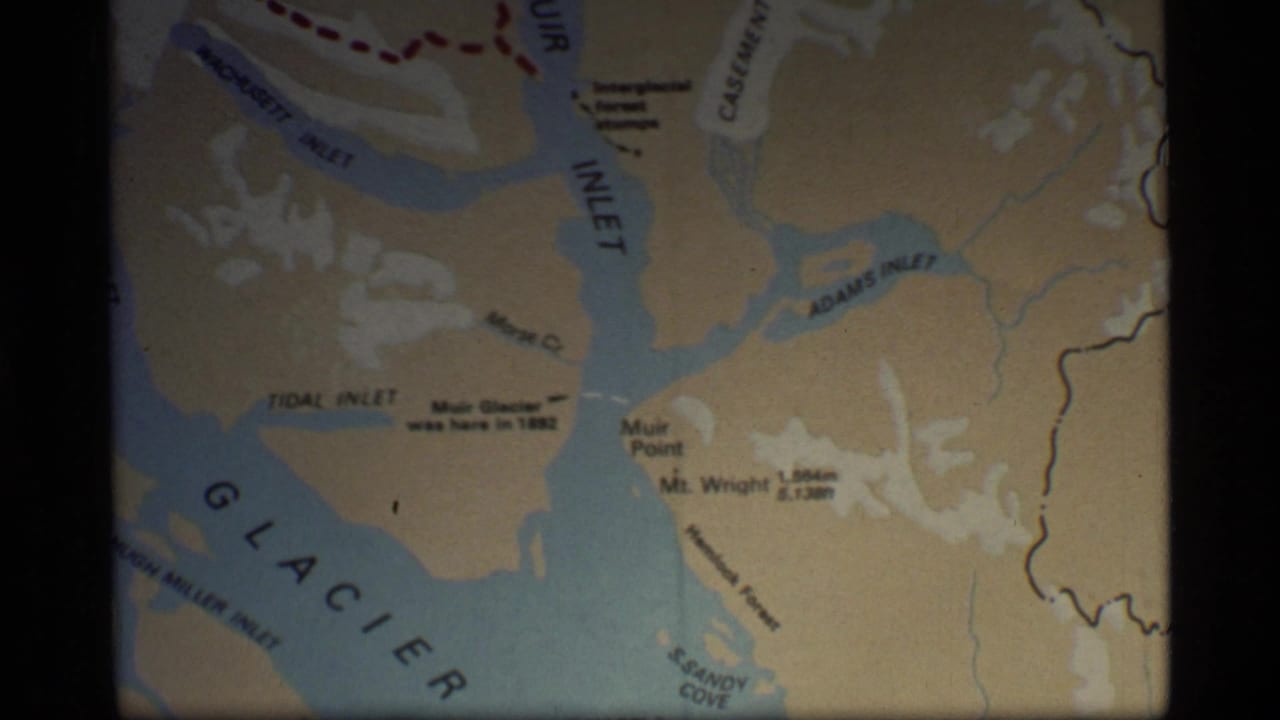 Contact-sheet frame showing a Glacier Bay map centered on Muir Inlet, Adams Inlet and nearby glacier labels.