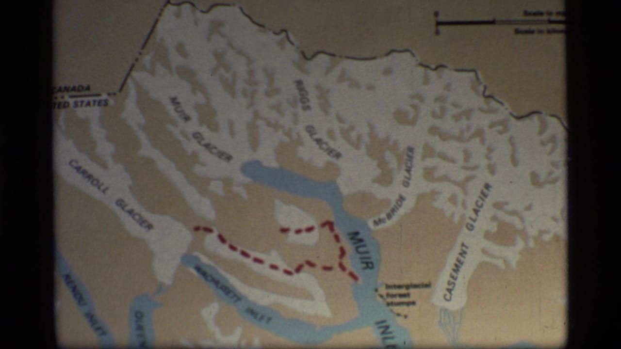 Glacier Bay map frame with route markings, inlet labels, and scale bar near the corner.