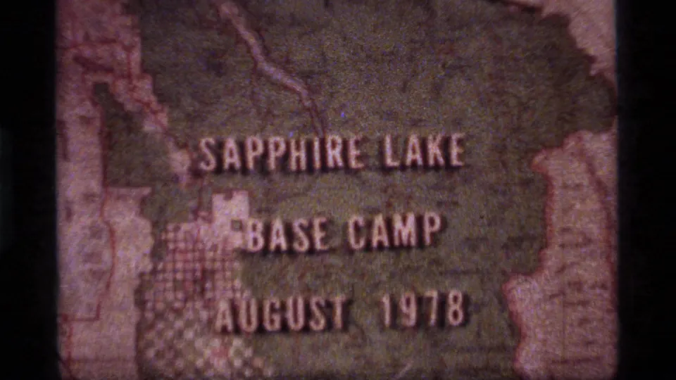 Close 8mm frame of the Sapphire Lake Base Camp map title with August 1978 visible over the lower portion.