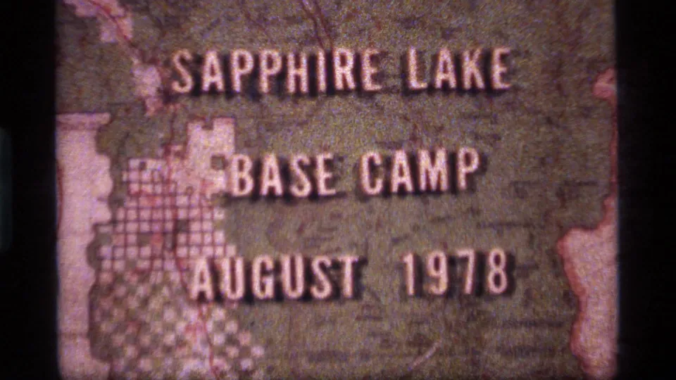 Sapphire Lake Base Camp title card, likely from the 1970s reel, showing August 1978 text on a faded map-style background.