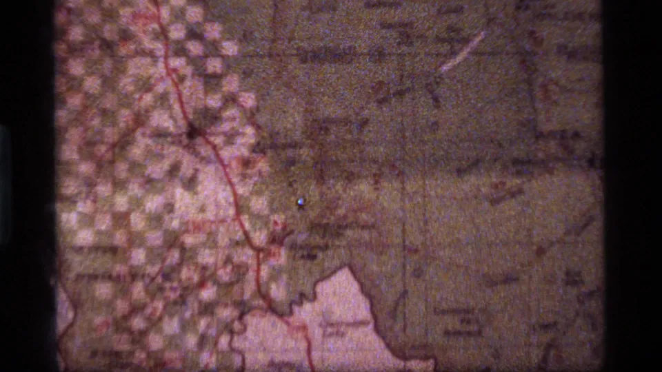 Soft 8mm frame showing the mapped area near the Peacock and Sapphire Lake context, with red route lines and faded labels.