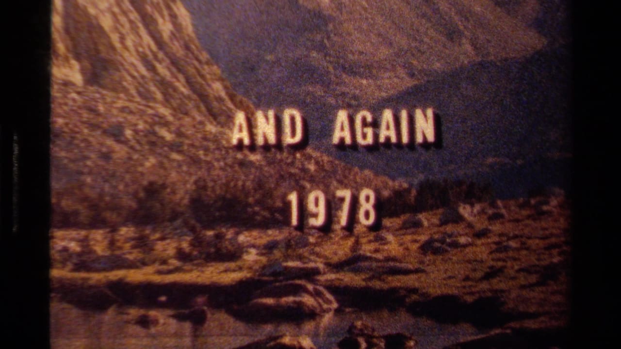 Warm 8mm frame from the Lake Tahoe clip showing "AND AGAIN 1978" over a rugged mountain and river landscape.