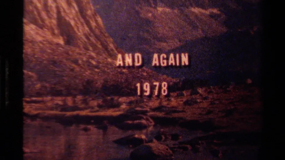 Warm, grainy 1978 Lake Tahoe title frame, showing AND AGAIN 1978 above a shadowed shoreline and mountain lake view.