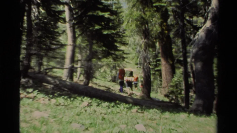 In the final 1978 Lake Tahoe frame, the hikers walk away down a forest path with their loaded packs visible.