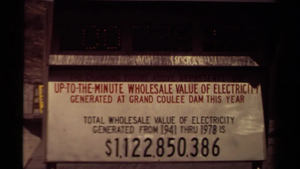 8mm frame showing the Grand Coulee Dam electricity display from a slightly lower crop, with the dot display and large printed total visible.