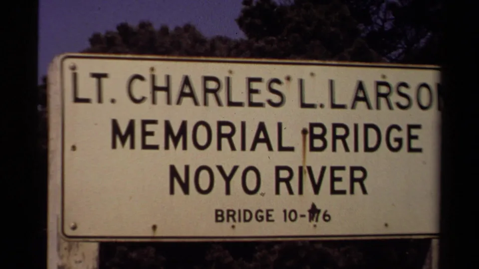 Close view of the Lt. Charles L. Larson Memorial Bridge sign for the Noyo River in Mendocino, California, shot on 8mm film.