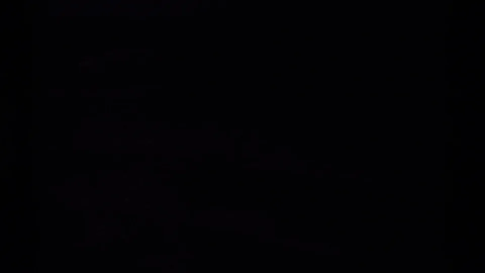 Underexposed 8mm frame from supplied 1980 Mendocino clip metadata, showing mostly black film with faint gate or edge artifacts.