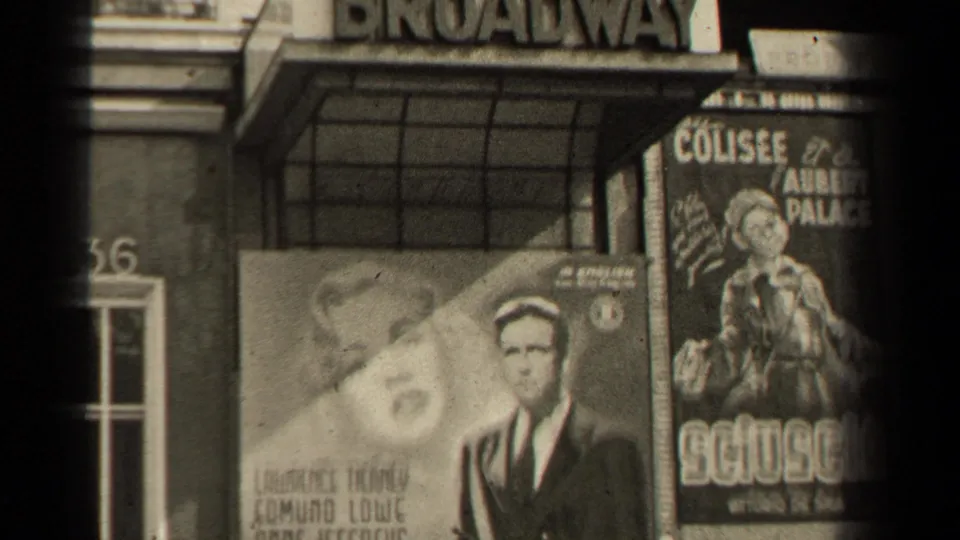 1947 Paris theater facade showing a Broadway marquee, Dillinger poster, adjacent poster display and a pedestrian near the right side.