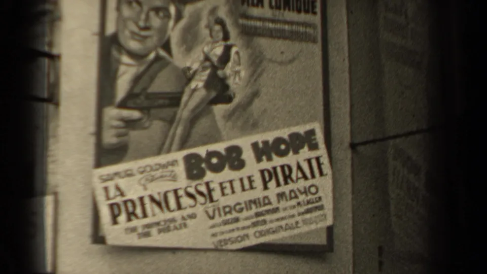 The 1947 Paris frame holds on the French La Princesse et le Pirate poster, with actor names and poster art partly legible.