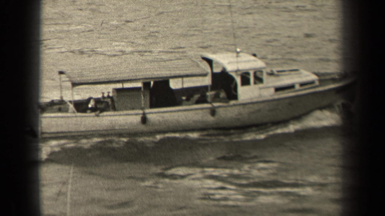 A closer black-and-white frame shows the motorboat’s cabin and covered midsection as it moves through the river, leaving churned water beside the hull.