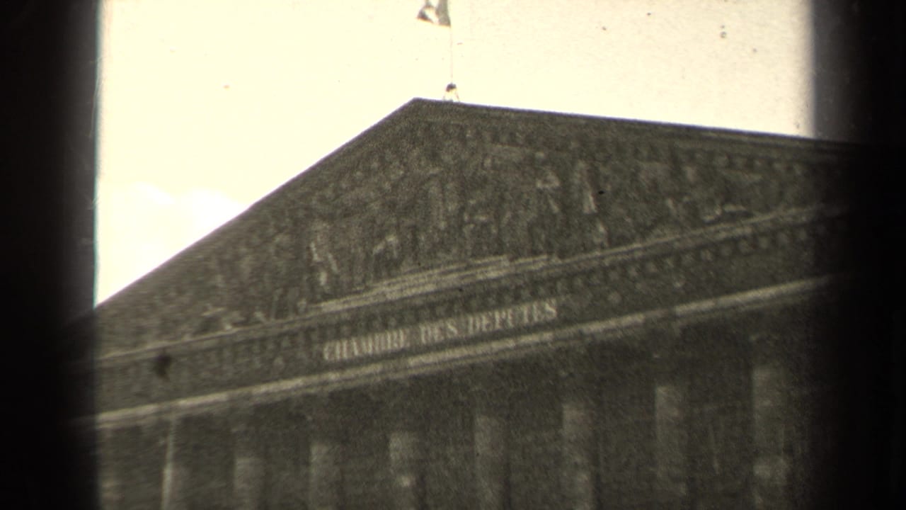 1947 Paris 8mm frame showing the upper facade and Chambre des Deputes inscription on a neoclassical building.