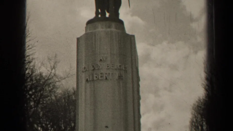 Black-and-white 1947 Paris frame focusing on the pedestal inscription below the equestrian statue.