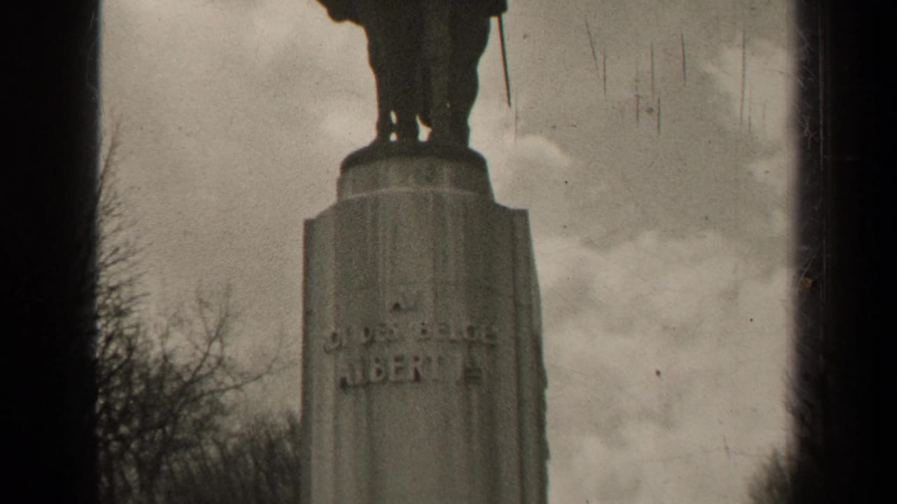 Low view of an equestrian statue pedestal with the inscription Albert I partly visible.