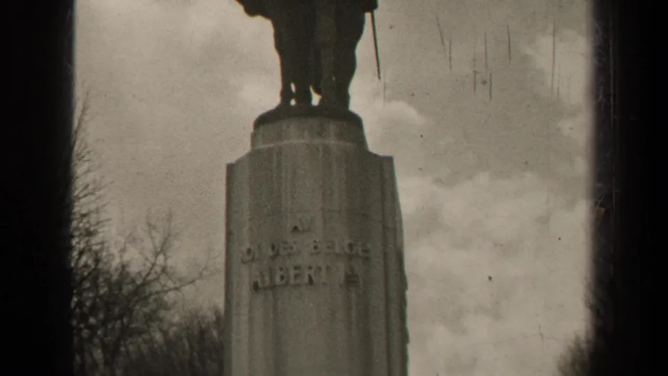 1947 Paris 8mm frame showing the lower part of an equestrian monument and a tall stone pedestal inscribed Albert I.