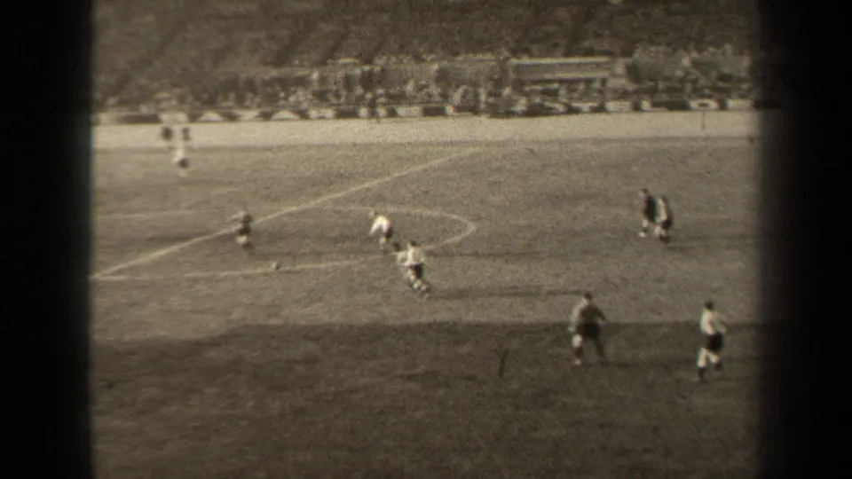 A 1947 Paris soccer match frame shows players moving near the center markings, with stadium seating in the distance.