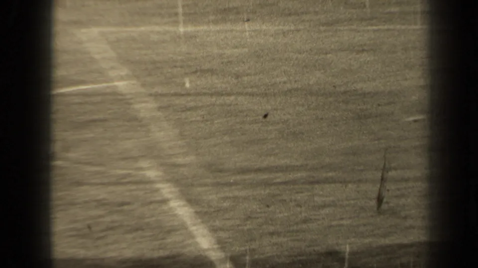1947 Paris soccer field view with curved white markings and little visible player action in the frame.