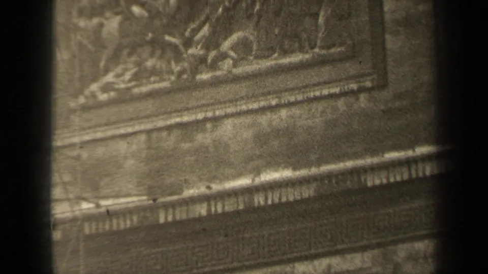 1947 Paris 8mm view of a facade relief panel, with clustered sculpted figures and a decorated lower edge.