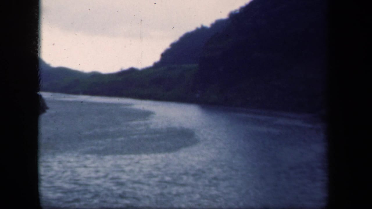 1941 New York home-movie view of a broad river curving between mountain slopes, with soft focus and visible film edges.