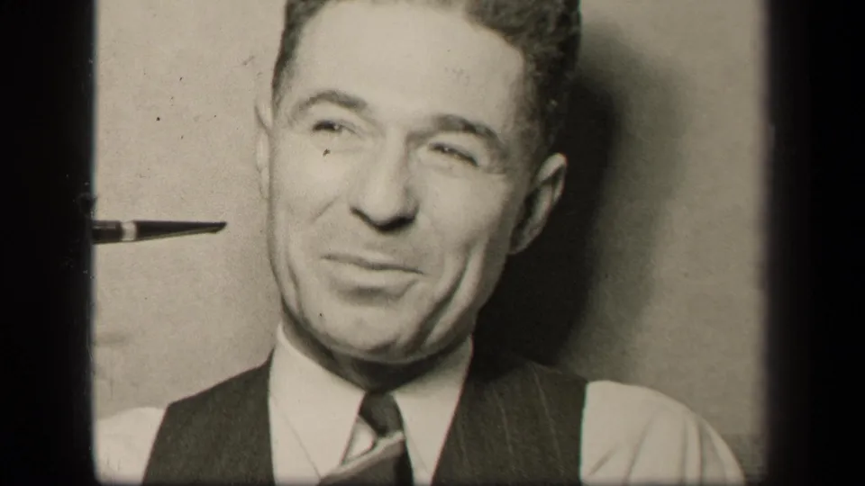 The final 1942 Sebring, Ohio frame shows the man in close-up, slightly smiling as the pipe remains raised near his face.