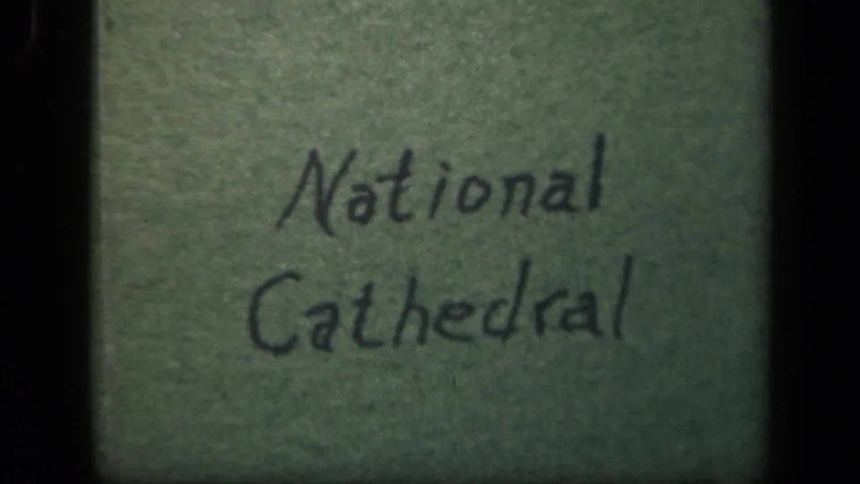 Handwritten 8mm title card reading National Cathedral, providing the clip's visible location cue.
