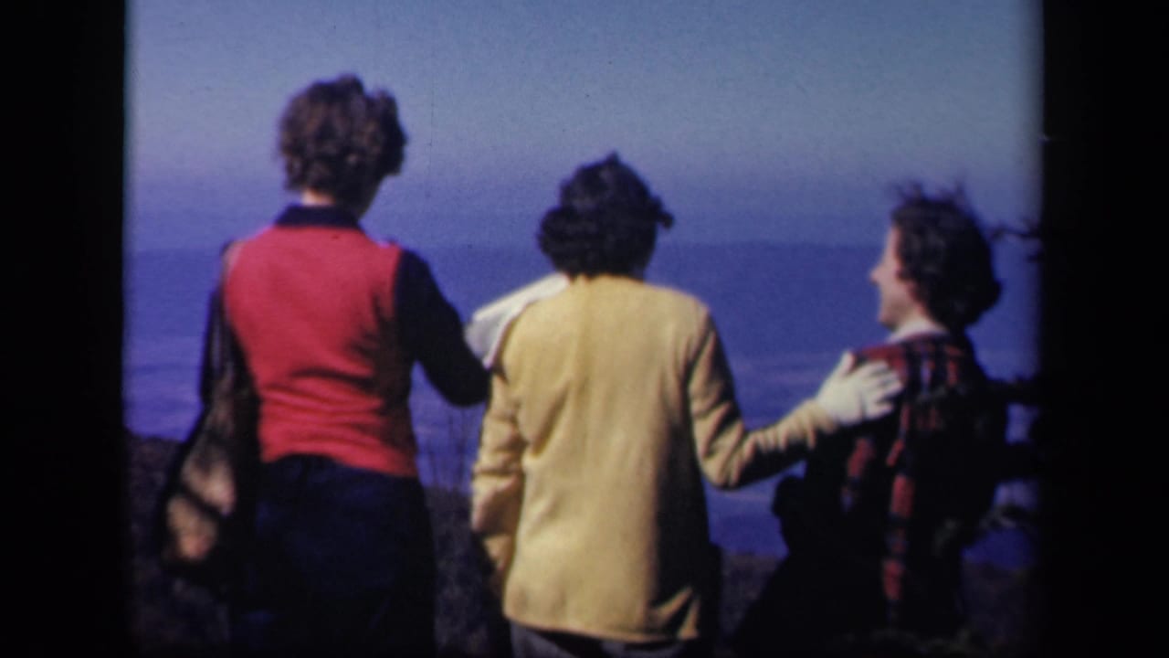 Three women at Skyline Drive in Virginia, seen from behind at a windy overlook in 1943 home-movie footage.