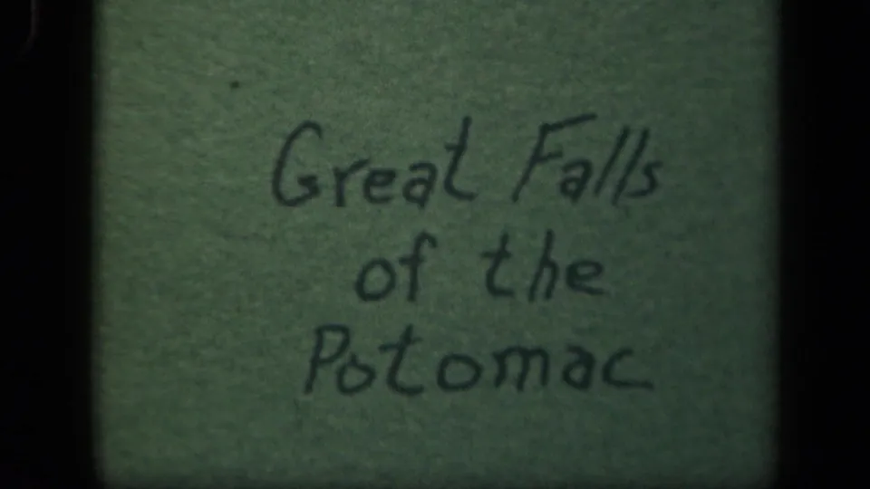 Another 1943 8mm title-card frame reading Great Falls of the Potomac, with green background and visible film texture.
