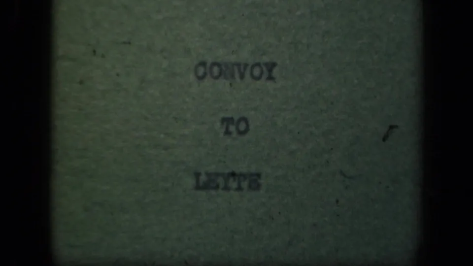 Typed CONVOY TO LEYTE title card on green paper, presented as a 1944 Leyte-related reel label with aged 8mm texture.