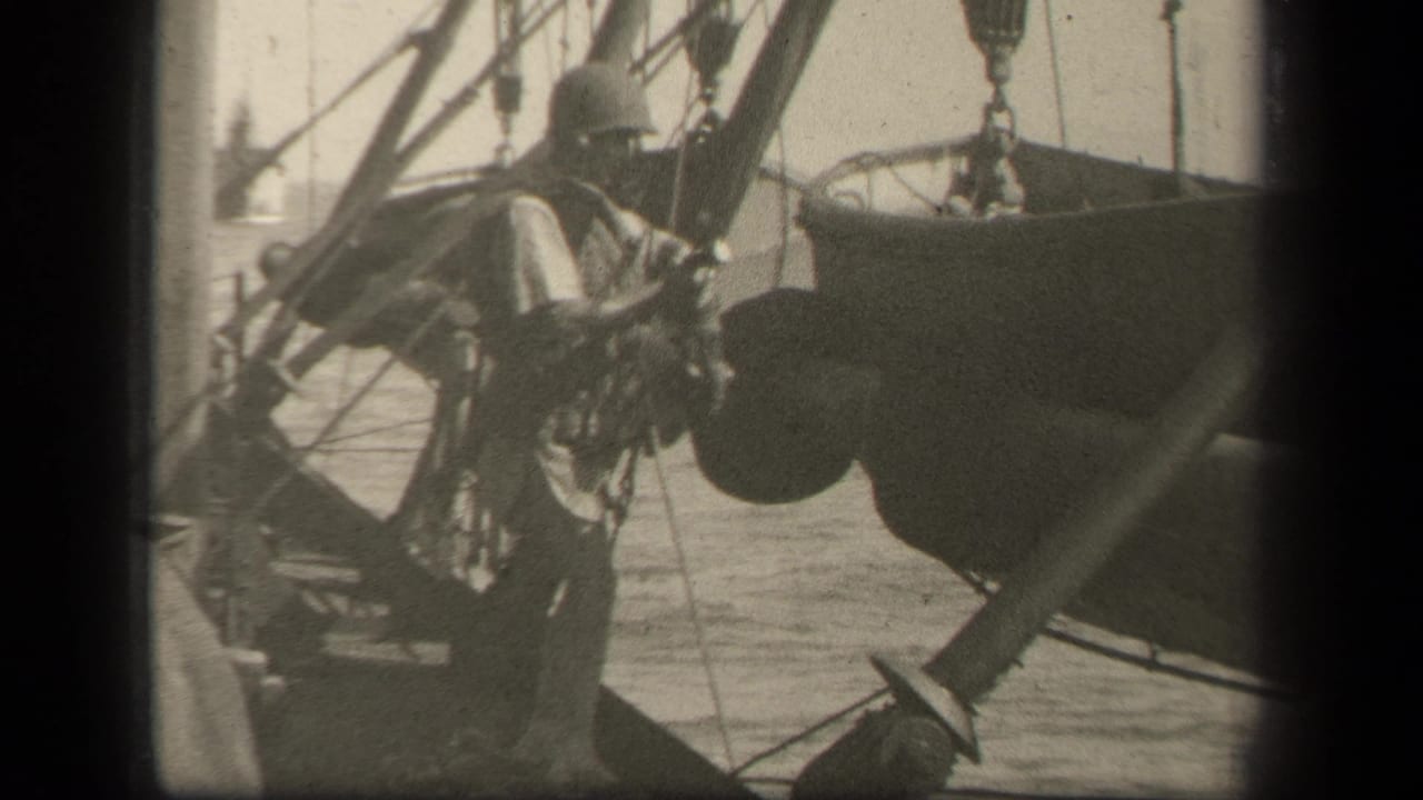 Soldier reaches toward a boat beside ship rigging with water in the background.