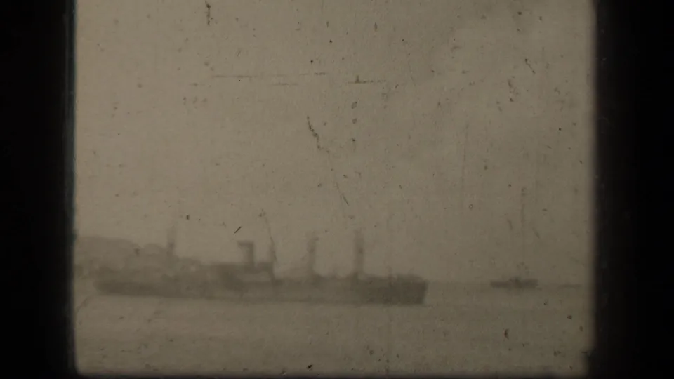Hazy vessel on open water, likely part of the Leyte Gulf naval scene identified in the supplied 1944 metadata.